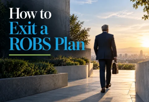 usiness owner reviewing ROBS 401(k) exit paperwork with a retirement plan administrator