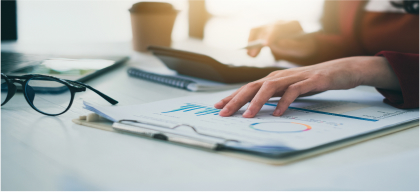 Persons hand on a document 