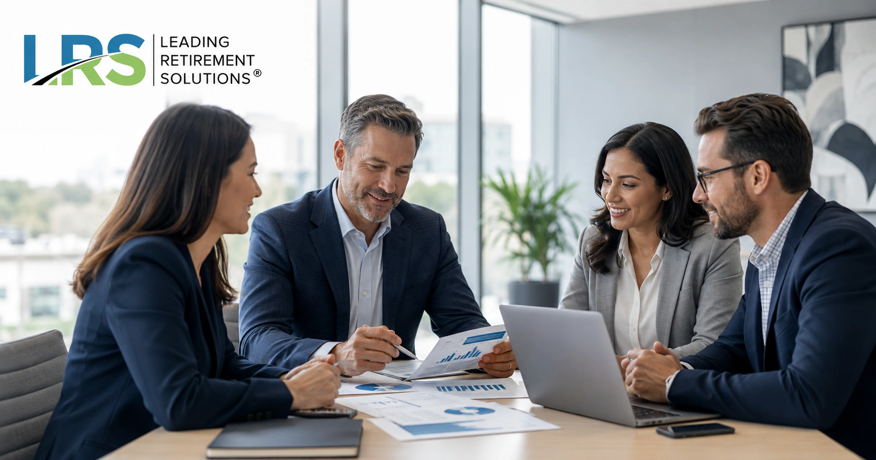 Leading Retirement Solutions team reviewing Seattle 401(k) retirement plan services and employer plan support